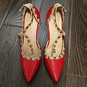 Studded red sole heels