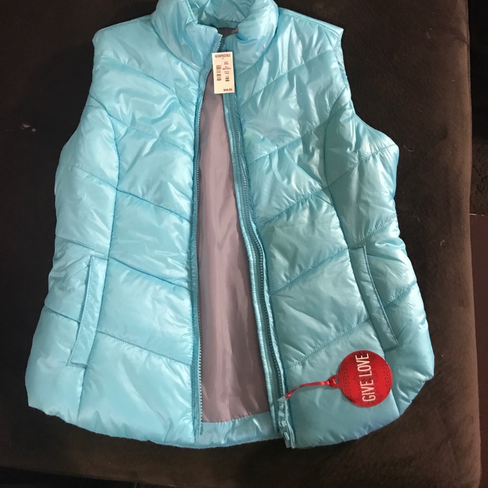 Light blue vest!