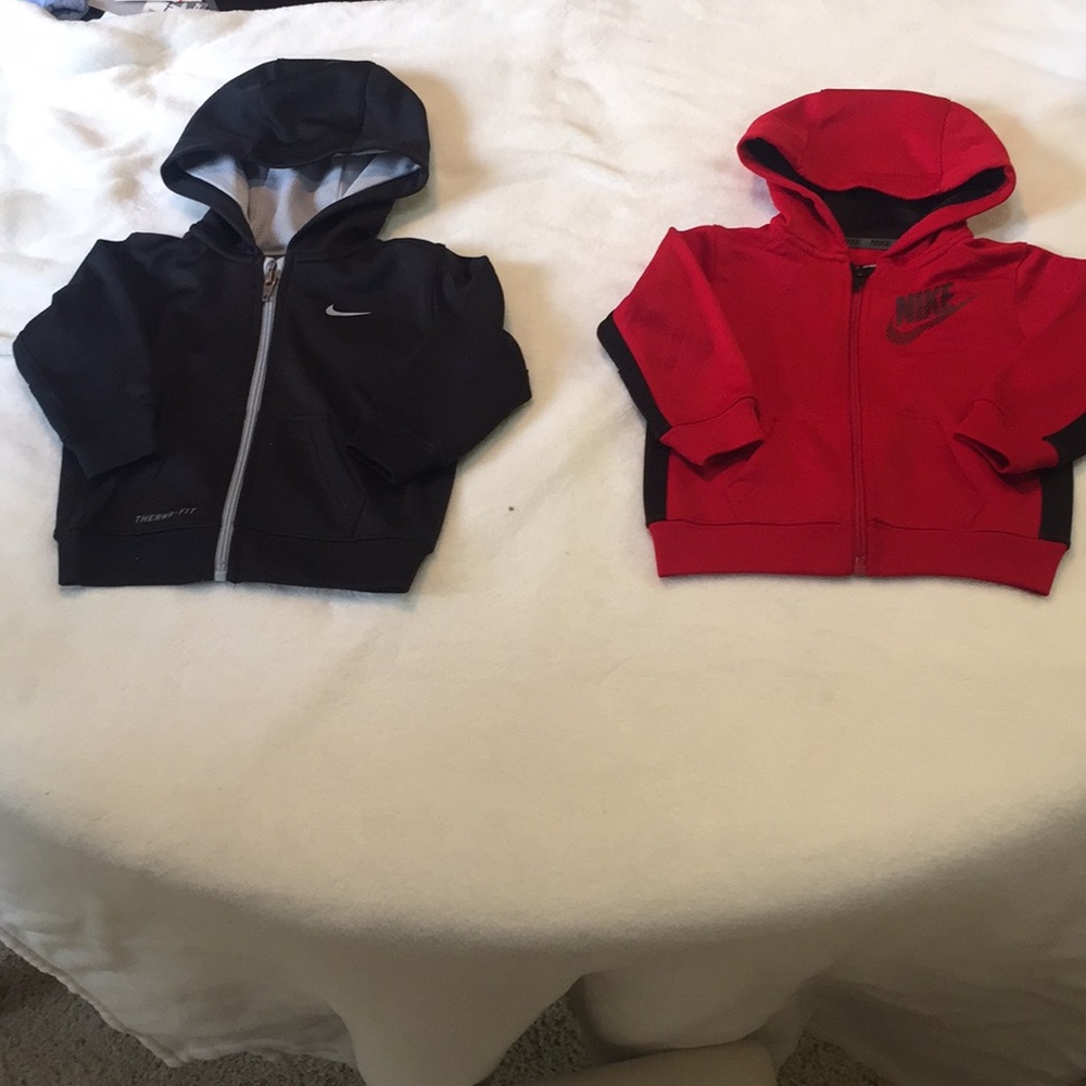 2 baby Nike jackets