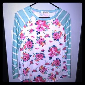 Raglan tee with striped sleeves and floral body
