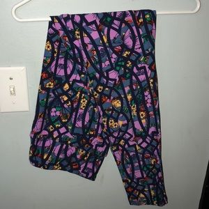 TV Leggings with purple, yellow and black accents