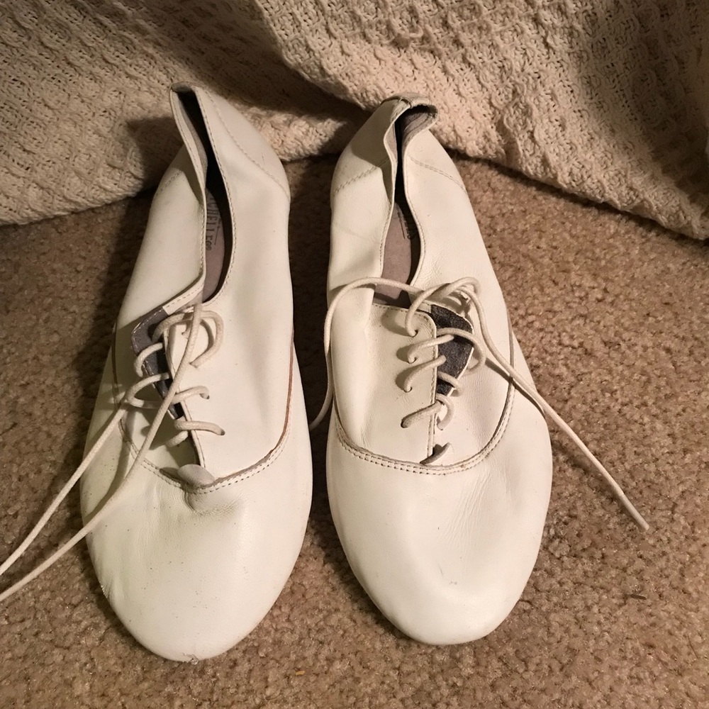 White leather lace up shoes