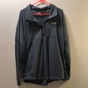 Pink varsity quarter snap sweatshirt.