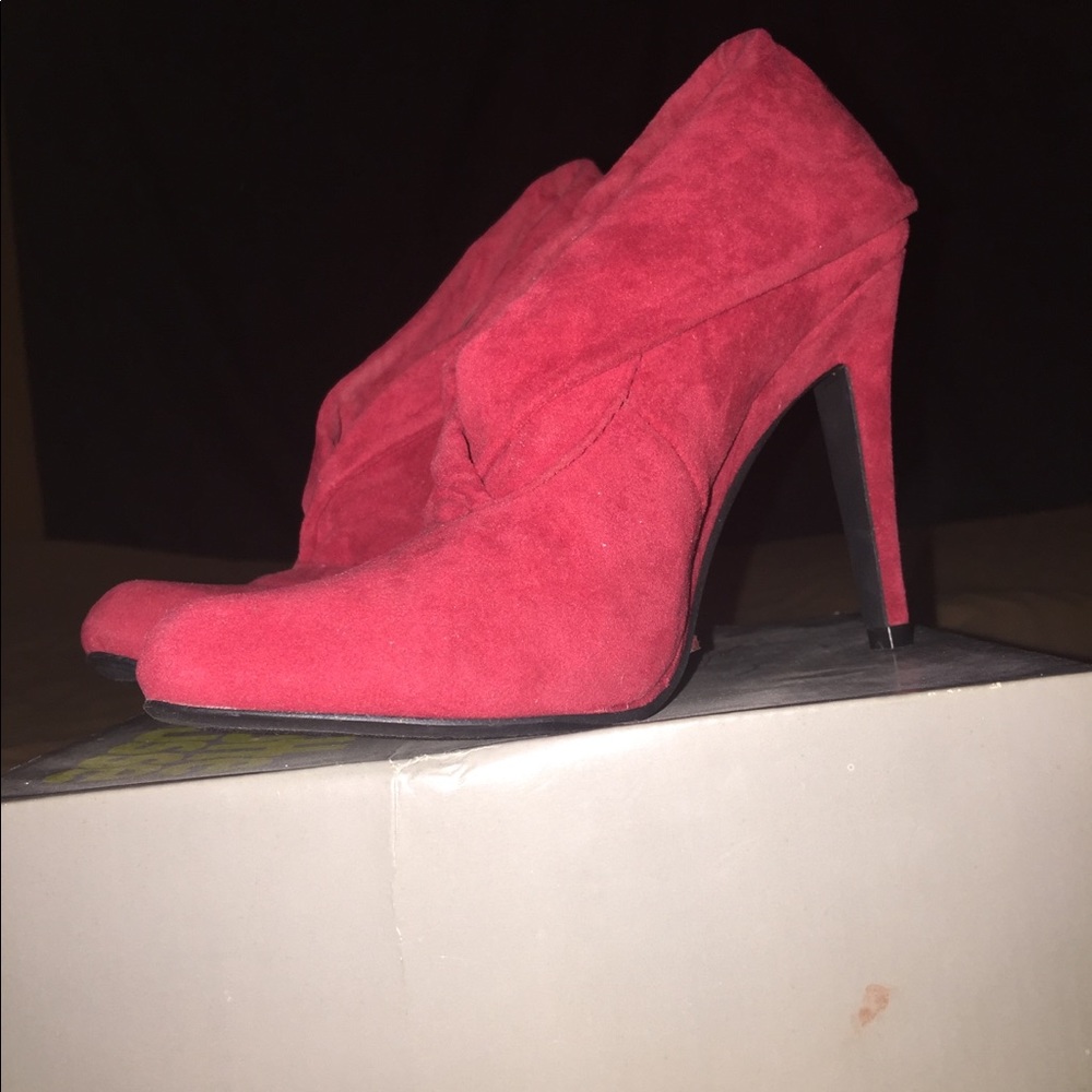 Charlotte Russe red booties. Never been worn.