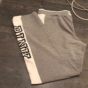 Pink straight leg sweats.