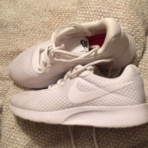 all white Nike Tanjun