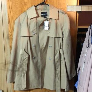 Tan trench coat 🧥 size large from express