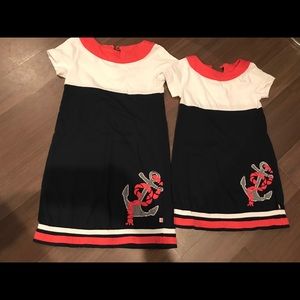 2 used but in good condition nautical dresses.