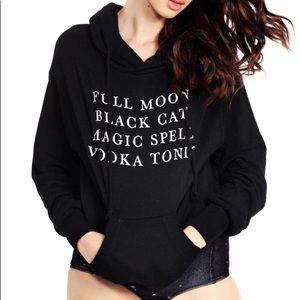 Full moon. Black cat. Magic spell. Vodka tonic.