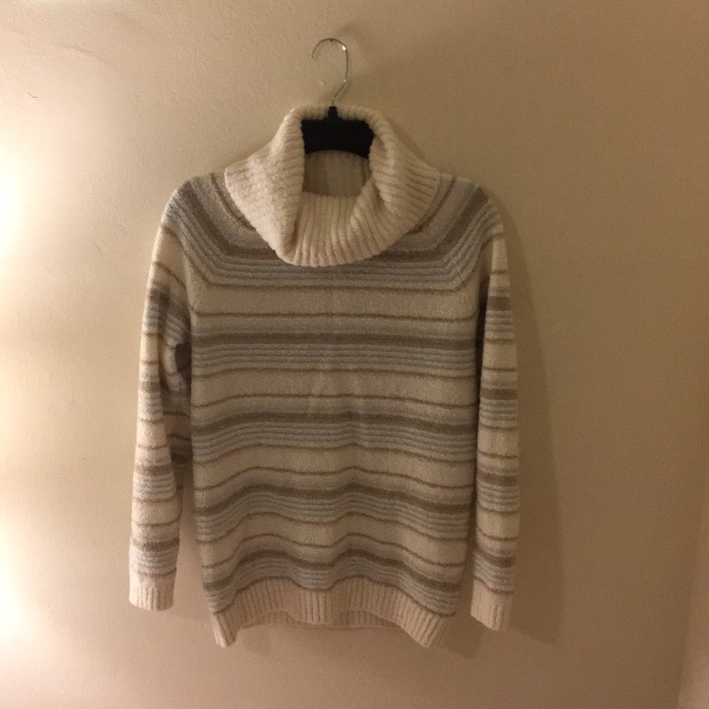 Turtle neck sweater. Cream w/ tan and blue stripes