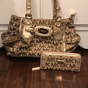 Authentic Michael Kors purse with matching wallet
