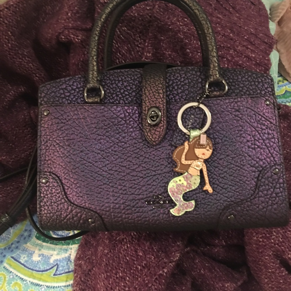 Hologram coach mercer  charm not included