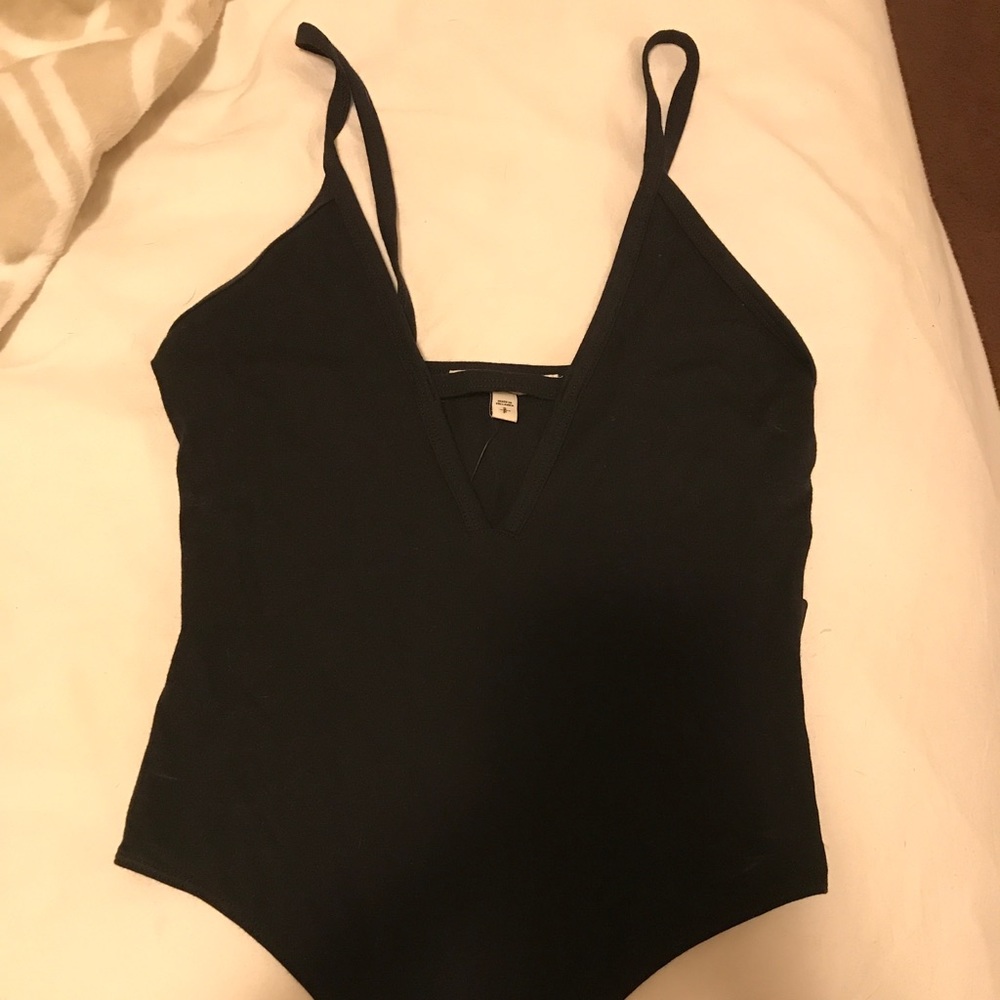 Women’s black body suit