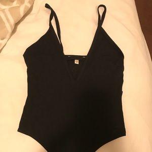 Women’s black body suit