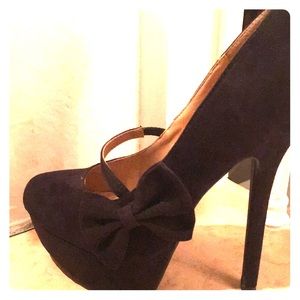 Black velvet stilettos.