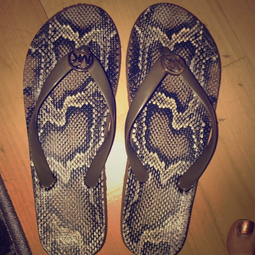 Michel Kors leopard print flip flops