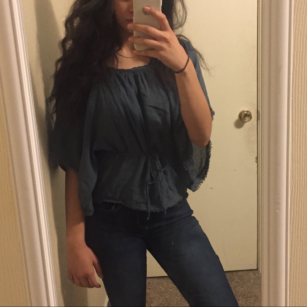 A ash toned blue flowy blouse