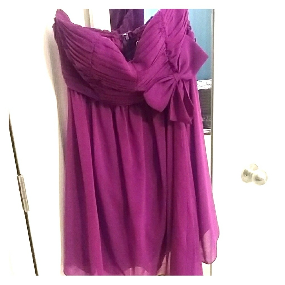 Purple strapless flowy dress w/ bow detail