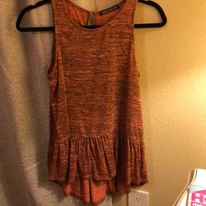 Women’s burnt orange colored high-low top