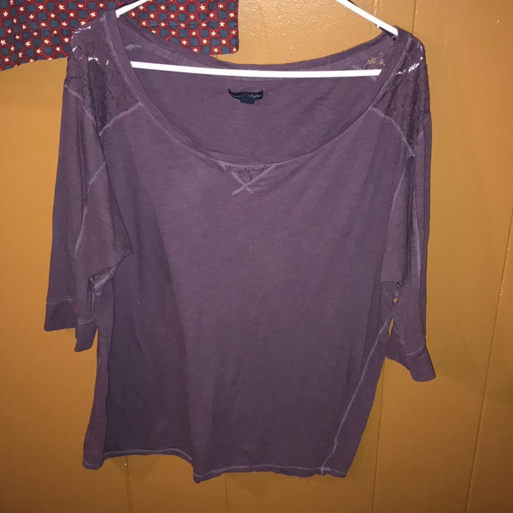 Mid sleeve top with lace on shoulders