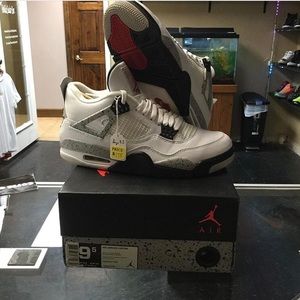 White cement Air Jordan 4’s
