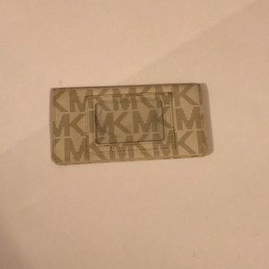 Vanilla Michael Kors check book wallet