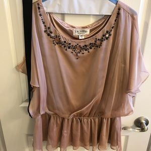 Blouse with sequin details and black satin belt.