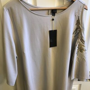 Blouse with sequin details. 6th and Lane