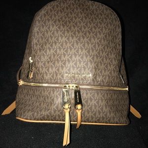 Michael Kors NWOT Rhea Zip Medium Backpack brown.