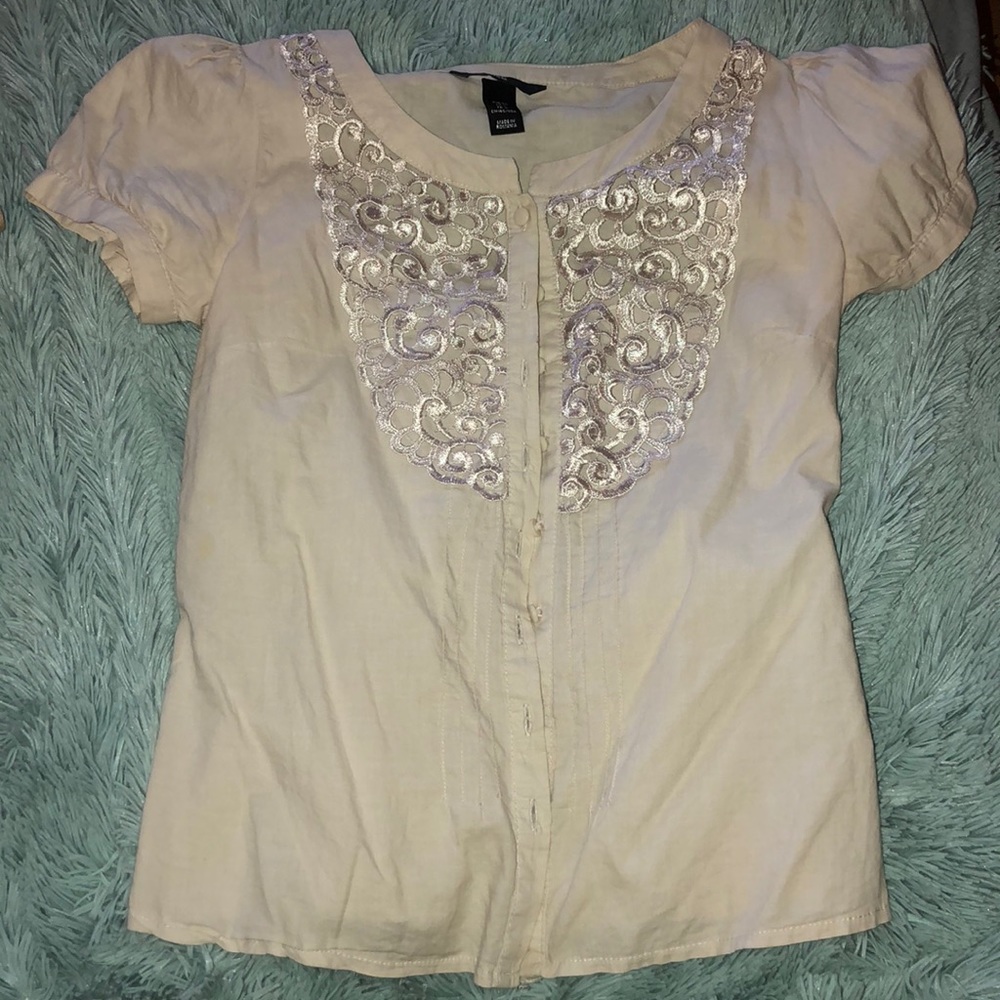 Light tan button down shirt