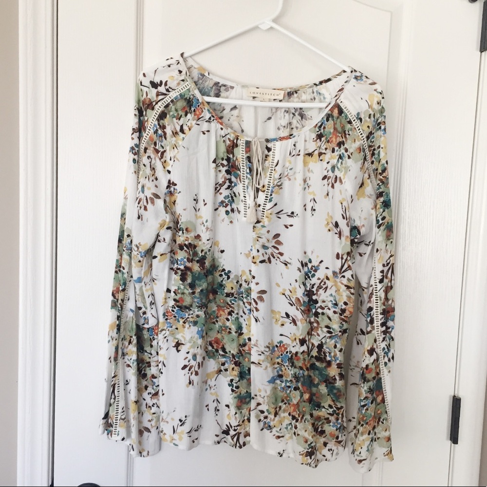 LOVESTITCH white with floral bell sleeved top.