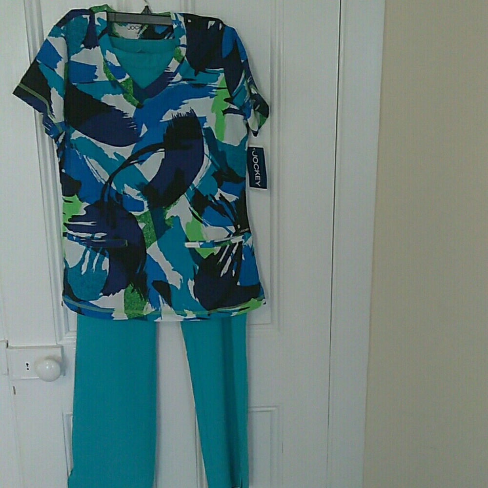 Nursing uniforms,nwt.price is for top and bottom