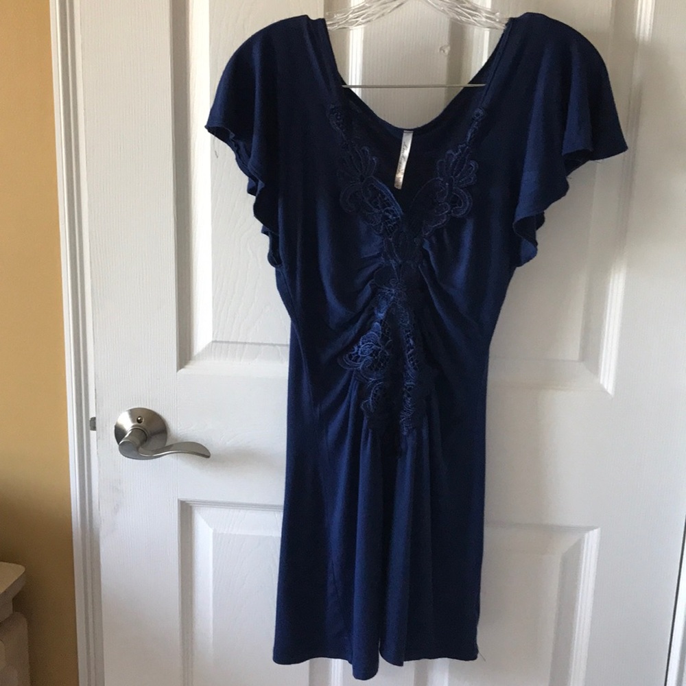 Royal blue top with lace trim. Size M.