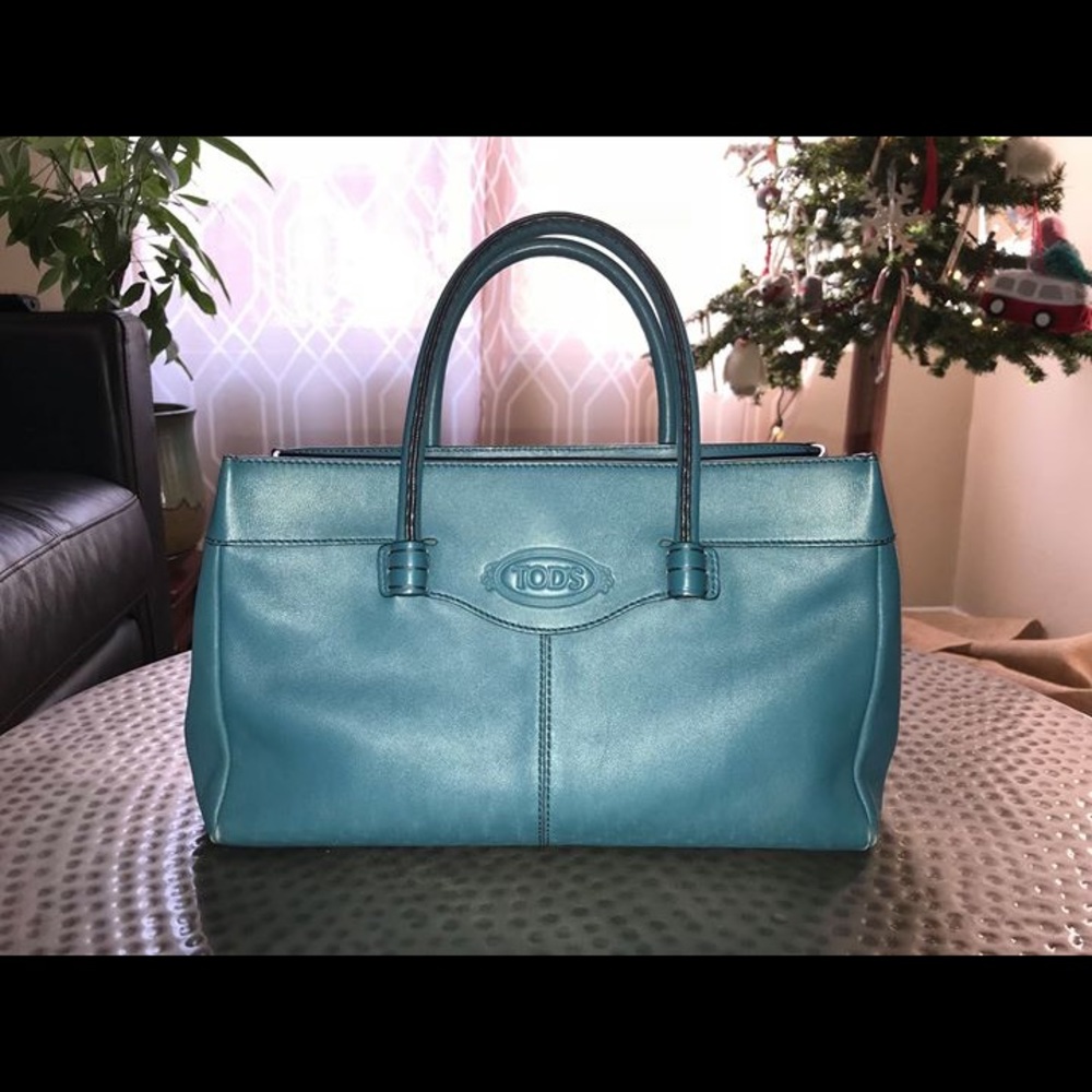 Like new, Tod’s Mocassino small tote in teal.