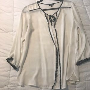 Limited White and Black trim Blouse.