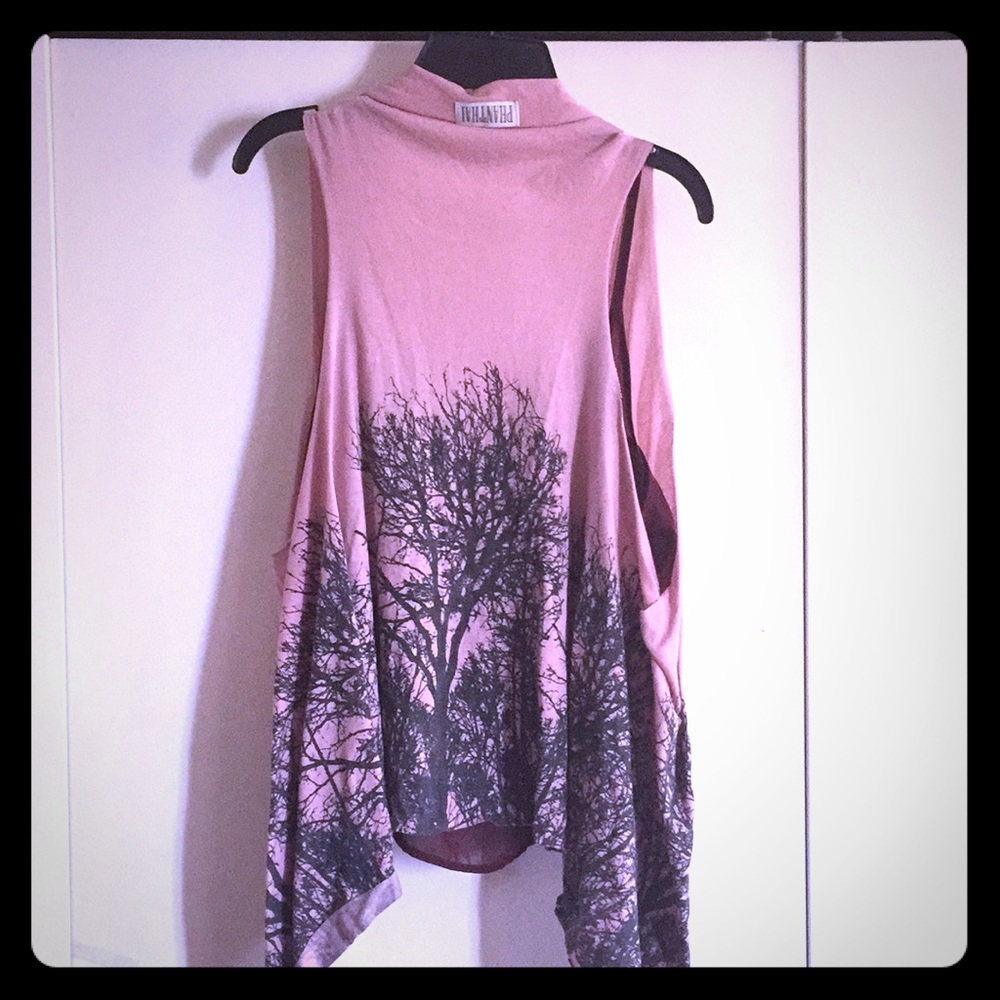 Vest with tree branch decor on back!