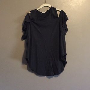 Black shirt shows shoulders
