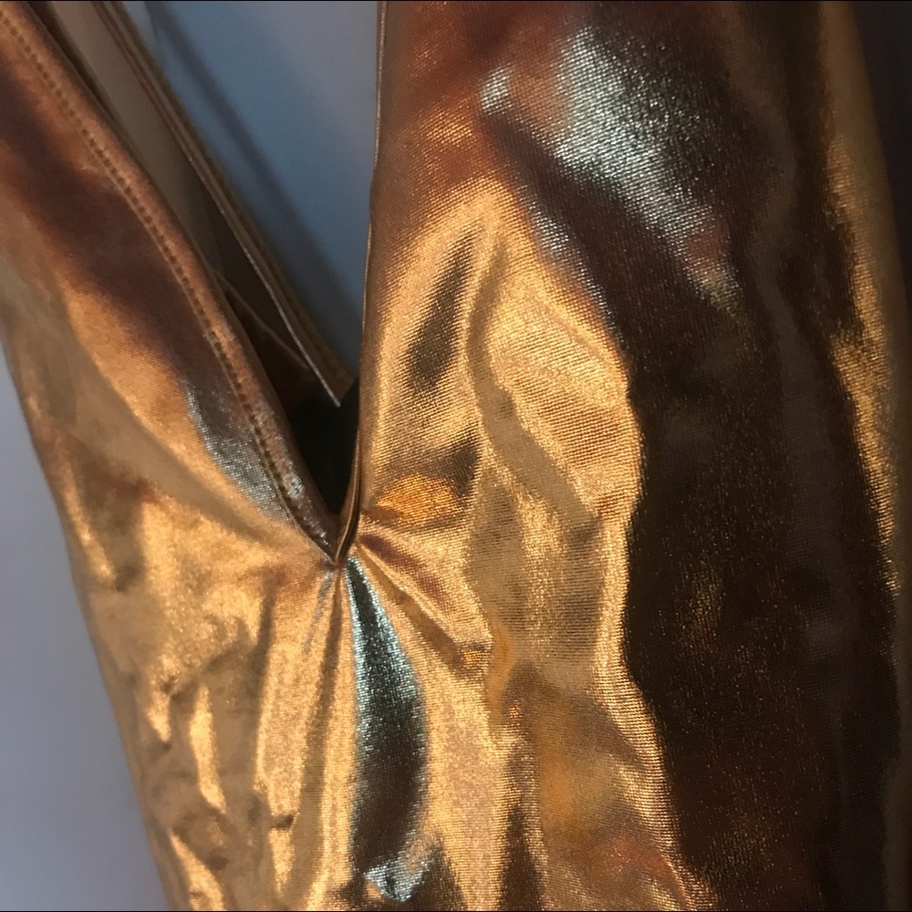 Gold metallic body suit