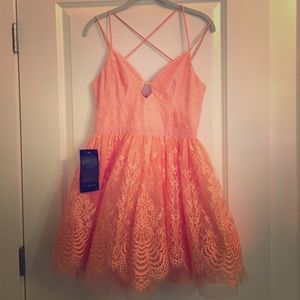 Bebe fit n flare orange coral lace dress