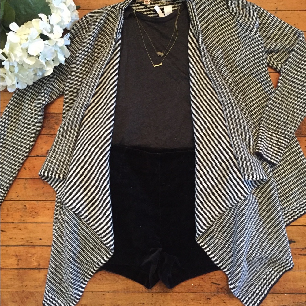 Striped sweater with draped opening