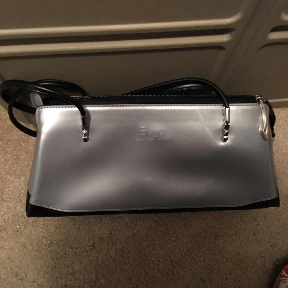 Small EUC Silver Beijo Bag