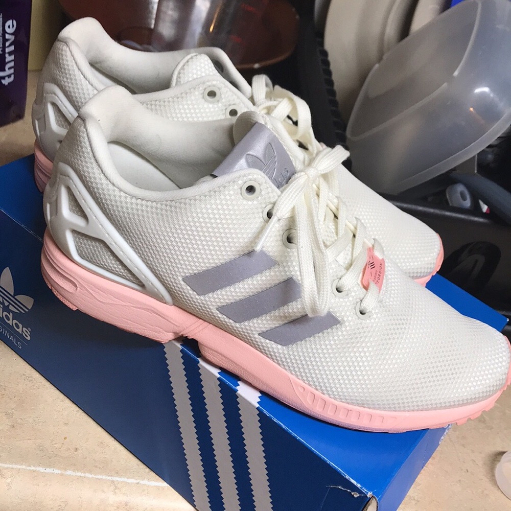 Pink and white adidas