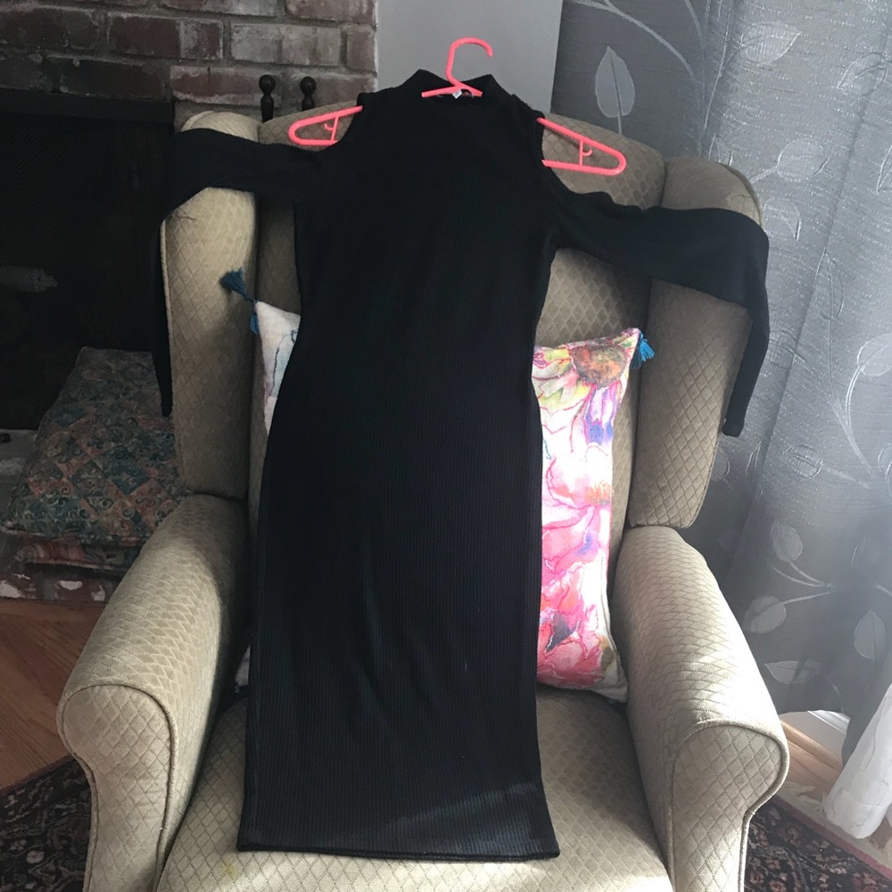 Form fitting black cocktail dress
