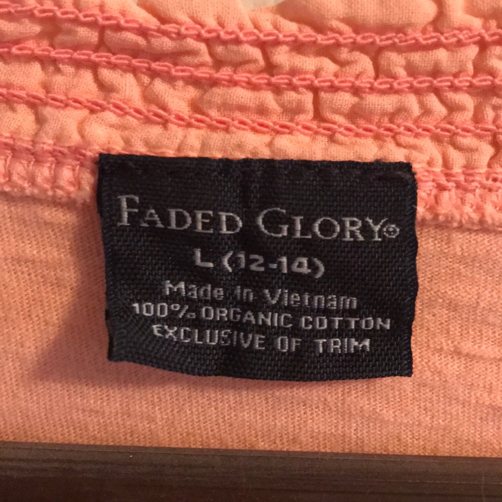 Peach/salmon long sleeve shirt.