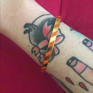 Brand new Kate Spade orange striped bracelet