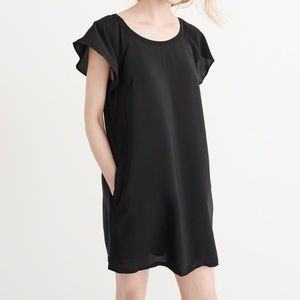 Black shift dress with flutter sleeves