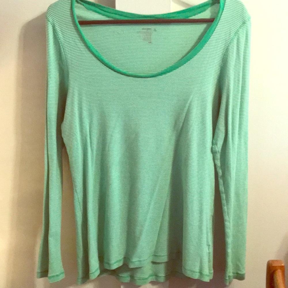 Green and white striped top.