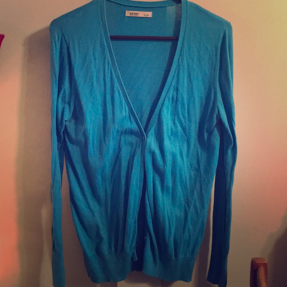 Blue cardigan.