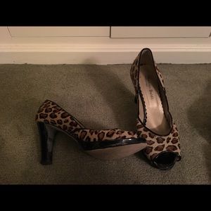 Leopard peep toe pumps.
