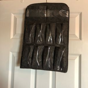 Hanging sunglasses holder